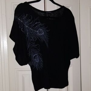 Black light sweater with rhinestone detail